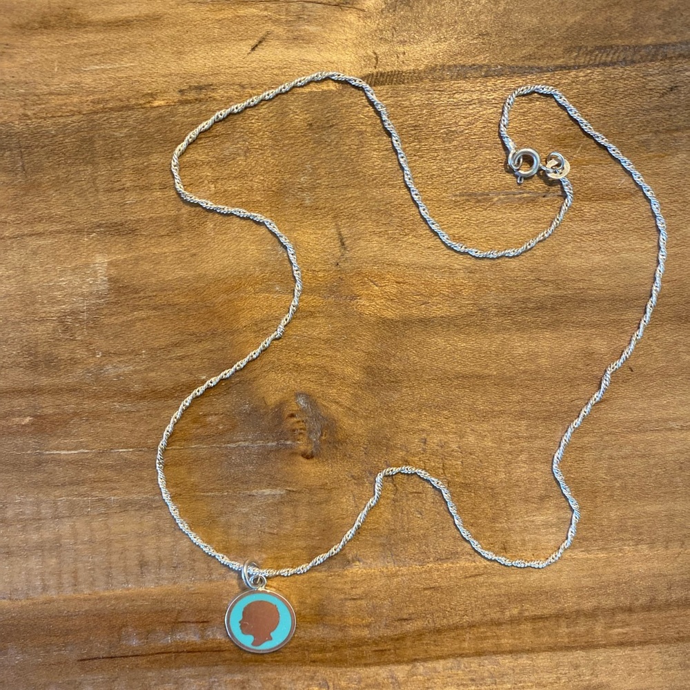 Tiffany & Co. sihlouette boy charm sterling silver blue enamel necklace